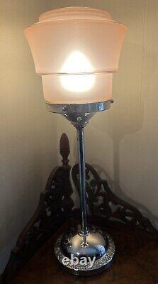 An attractive pink glass and chrome art deco table lamp c. 1930