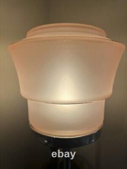 An attractive pink glass and chrome art deco table lamp c. 1930