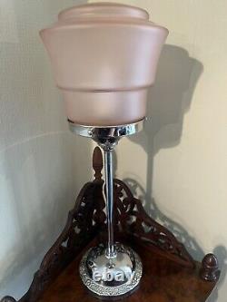 An attractive pink glass and chrome art deco table lamp c. 1930