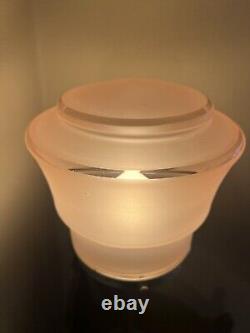An attractive pink glass and chrome art deco table lamp c. 1930