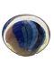 Art glass in pink, blue & black oval shaped paperweight signed by Paul Bendzunas