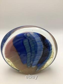 Art glass in pink, blue & black oval shaped paperweight signed by Paul Bendzunas