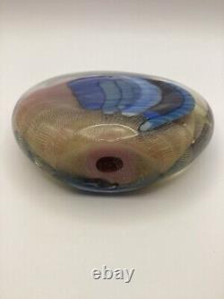 Art glass in pink, blue & black oval shaped paperweight signed by Paul Bendzunas