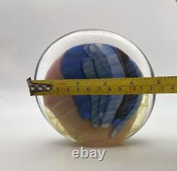 Art glass in pink, blue & black oval shaped paperweight signed by Paul Bendzunas