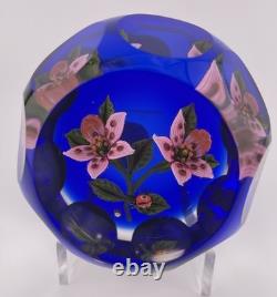John Deacons Faceted Lampwork Pink Flowers/Ladybug On Blue Base Paperweight