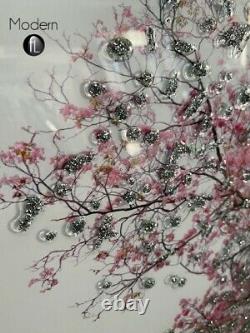 Pink blossom tree on white back ground in a mirrored frame, 3D glitter art