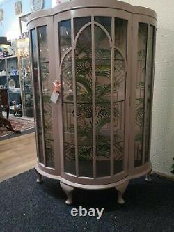 Restored soft pink art deco cocktail cabinet. Tall standing glass front display
