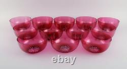 Set of twelve Holmegaard bowls in pink art glass. Danish design, mid-20th C