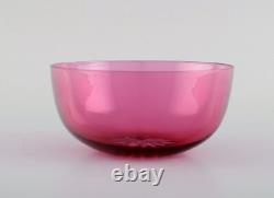 Set of twelve Holmegaard bowls in pink art glass. Danish design, mid-20th C