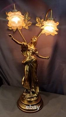 Tall Art Nouveau Auguste Moreau style figurine lamp. Frilled pink glass shades