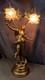 Tall Art Nouveau Auguste Moreau style figurine lamp. Frilled pink glass shades