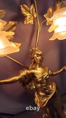Tall Art Nouveau Auguste Moreau style figurine lamp. Frilled pink glass shades