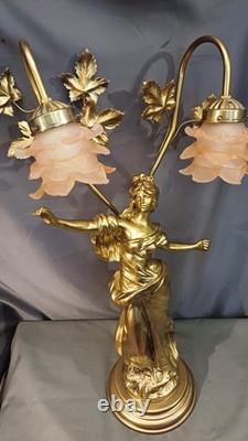 Tall Art Nouveau Auguste Moreau style figurine lamp. Frilled pink glass shades