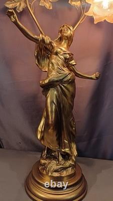 Tall Art Nouveau Auguste Moreau style figurine lamp. Frilled pink glass shades
