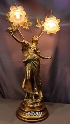 Tall Art Nouveau Auguste Moreau style figurine lamp. Frilled pink glass shades