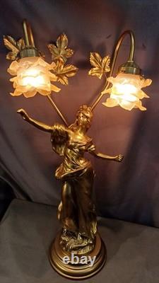 Tall Art Nouveau Auguste Moreau style figurine lamp. Frilled pink glass shades