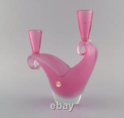 Two-armed Murano candle holder in pink hand-blown art glass. Italian design