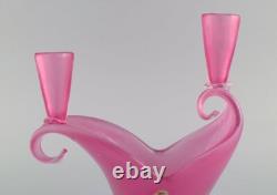 Two-armed Murano candle holder in pink hand-blown art glass. Italian design