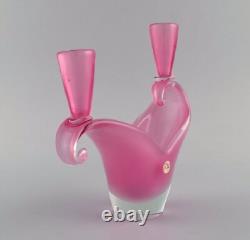Two-armed Murano candle holder in pink hand-blown art glass. Italian design