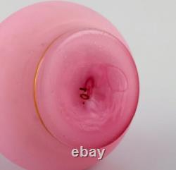 Two vases and two flacons in pink mouth-blown art glass decorated with gold