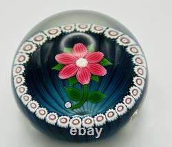 William Manson lampwork glass paperweight with Pink Flower on blue WM80 Cane